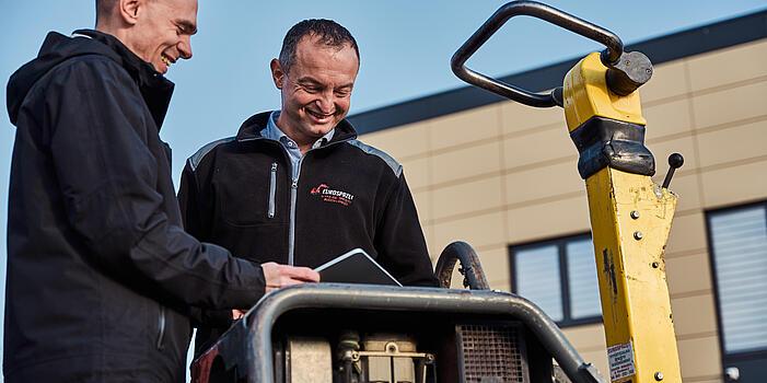 Two men in conversation